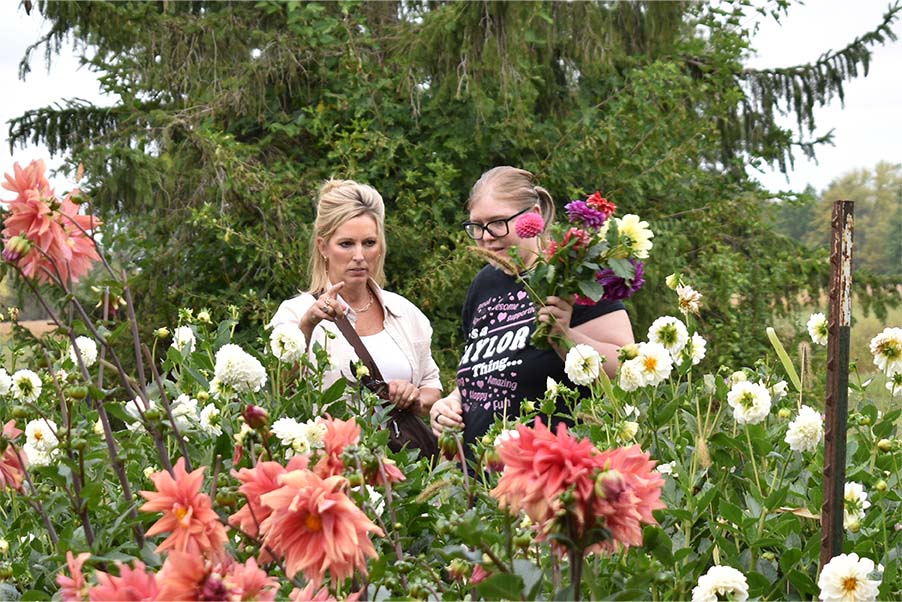 Lori and Ruth picking flowers