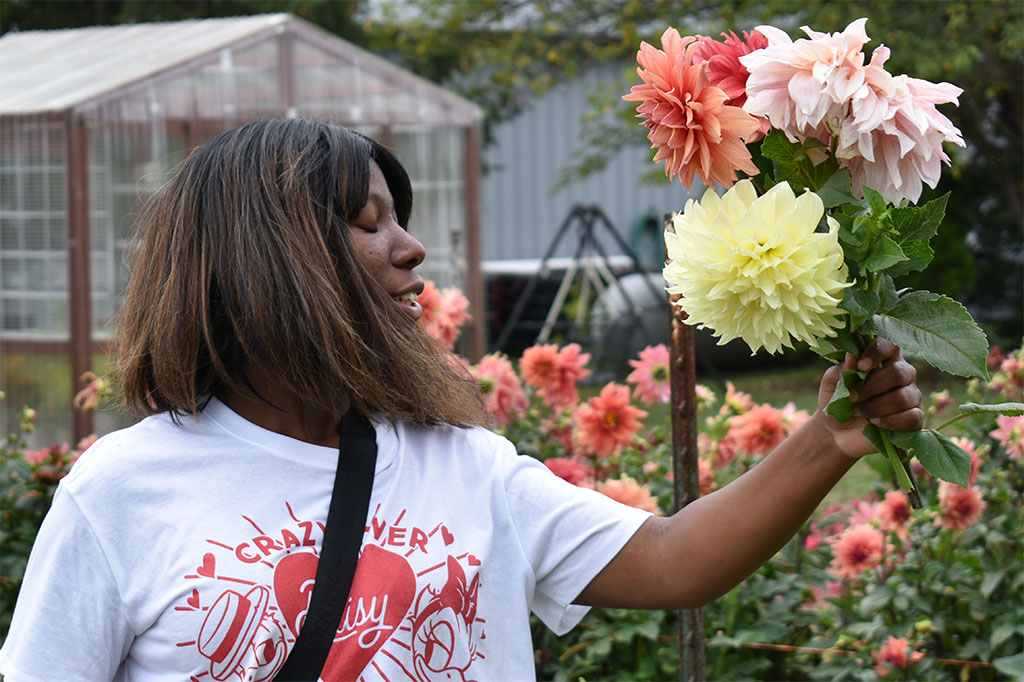 Patricia picking out flowers at Flower Farm